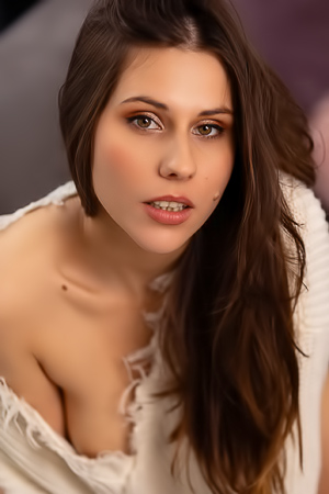 Amber Slassh Teases With Perky Nipples And Spread Legs On The Couch